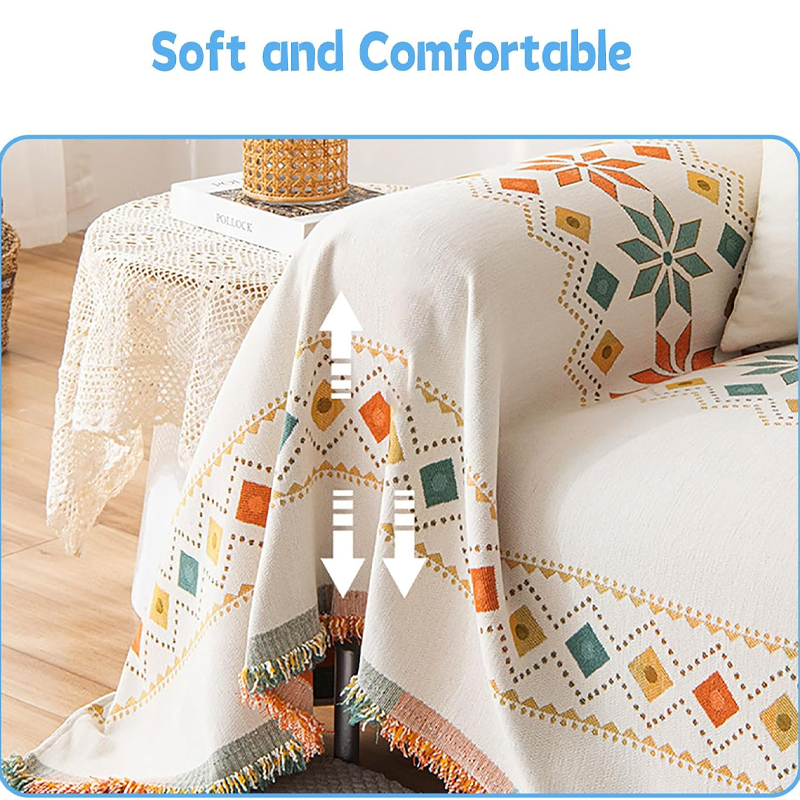 Housse réversible pour canapé bohème avec pompons – style chic et cosy